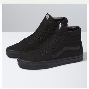 All black high top Vans